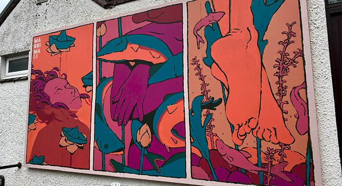 Windermere Arctic Charr mural on the Lake District Boat Club for LICAF 2022 by Mehdi Annassi